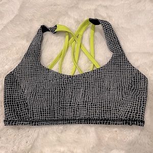 LULULEMON sports bra. Black & white with bright lime straps. Size 6